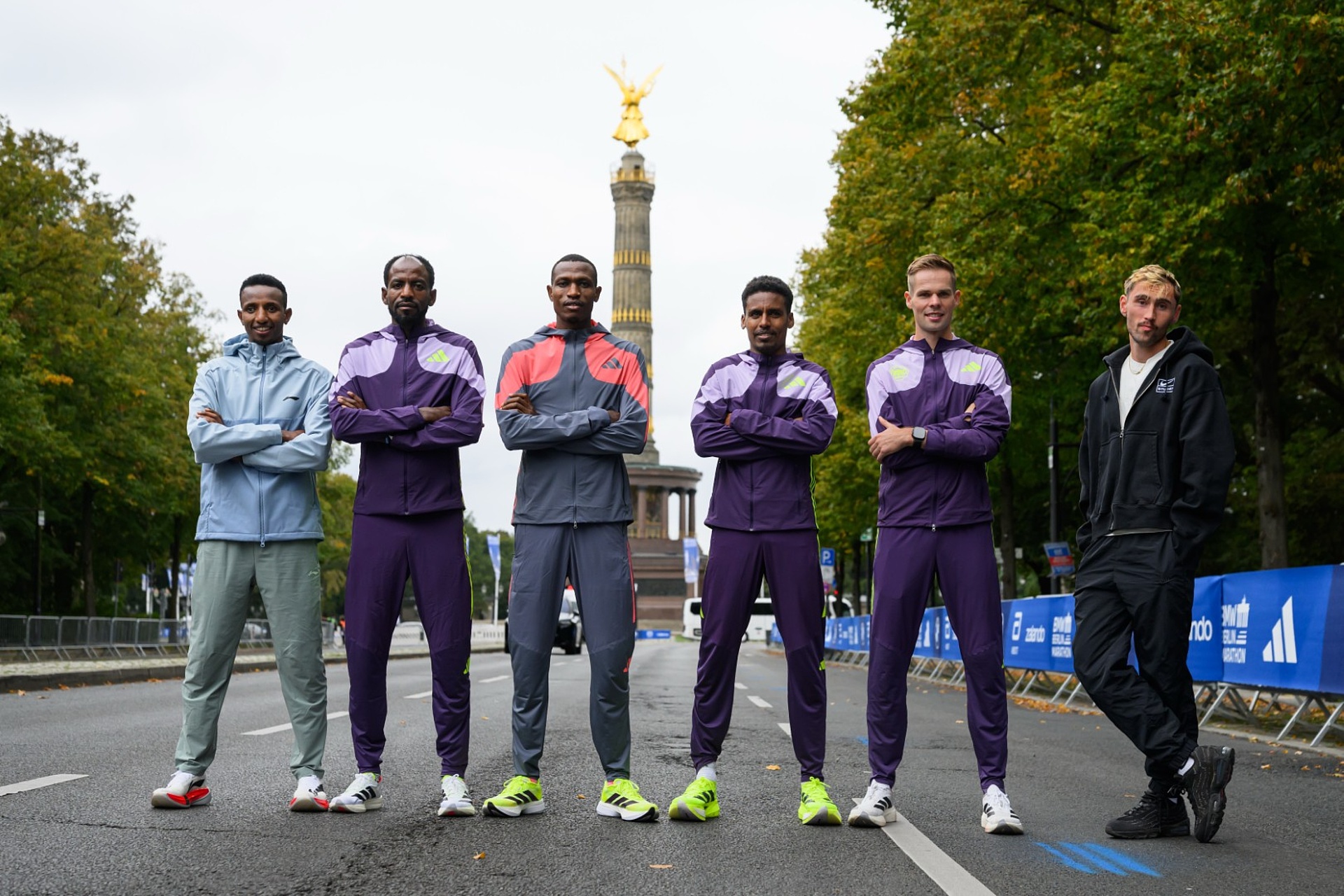 From left to right: Selemon Barega, Guye Adola, Gabriel Gerald Geay, Haftom Welday, Sebastian Hendel, and Aaron Bienenfeld on Straße des 17. Juni in front of the Victory Column.